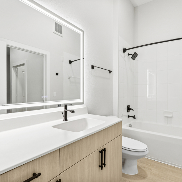 NoHo Flats - Apartments in Tampa - Renovated BathRoom